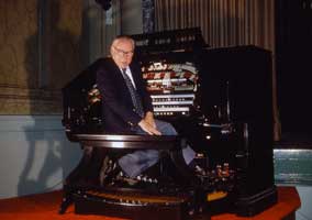 Photo: Gaylord Carter at the console of the Albee Wurlitzer organ.