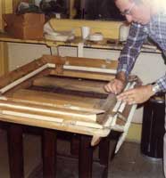 Photo of volenteer sealing a bellows