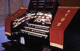 A picture of the console with a deco drop cloth that says ATOS OVC taken in 1999.