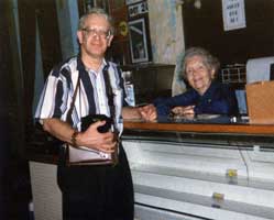 A picture of Mike Detroy and Blanche Underwood at the concession stand of the Emery Theatre taken in 1999.